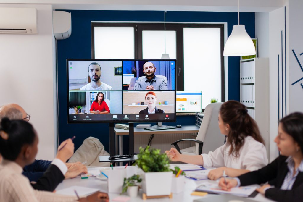 a group of people in a meeting